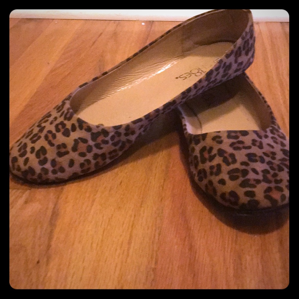 Used leopard ballet flats in good condition